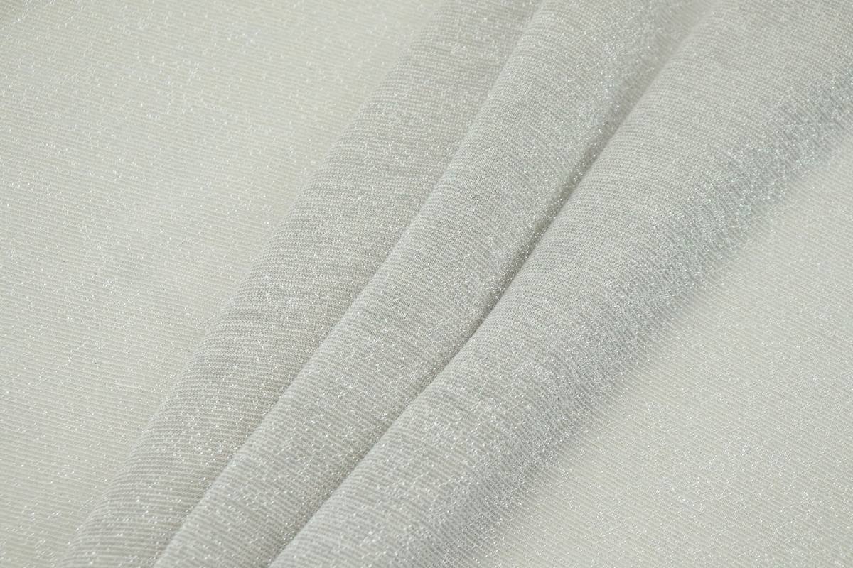 a close up view of a white fabric